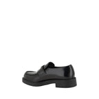 Prada Black Rubber Platform Loafers